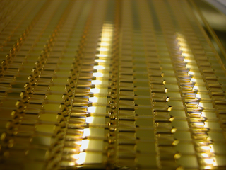 Fully-populated wafer with 500µm deep cavities, ready for electroforming